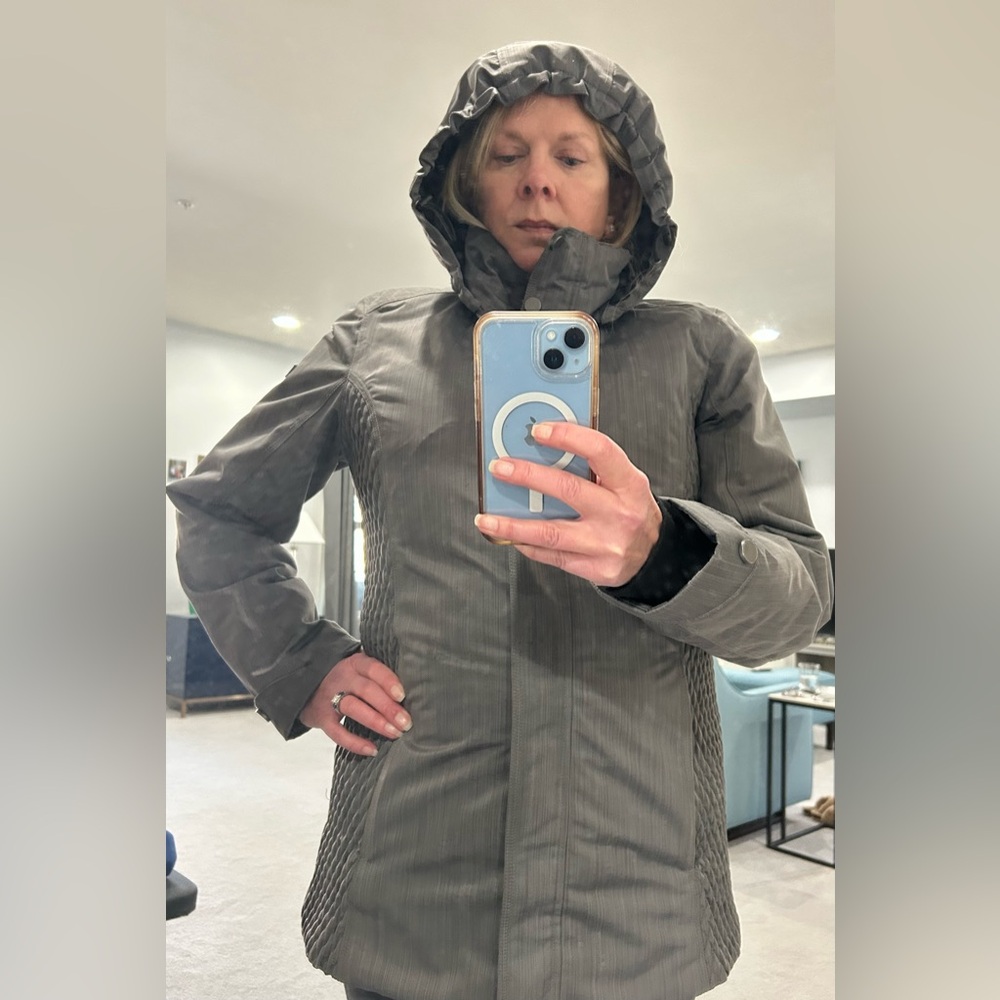 Size 8 ski jacket in gray. Barely worn. High quality with all bells and whistles